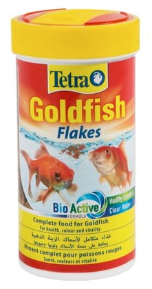 Goldfish flakes, common goldfish food.